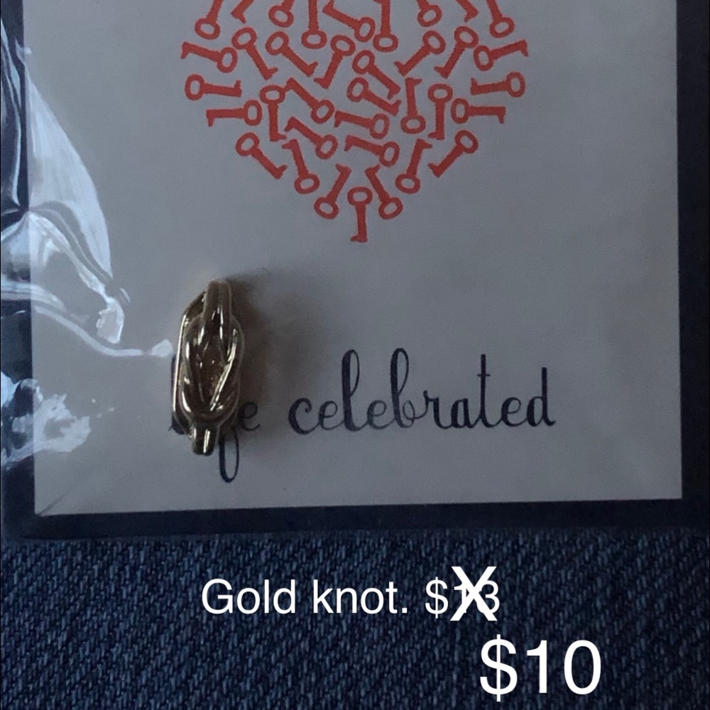 KEEP Collective gold knot.